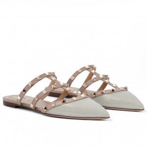 Valentino Garavani Rockstud Flat Mules In Opal-grey Patent Leather