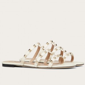 Valentino Garavani Rockstud Flat Sandals In White Calfskin