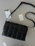 Bottega Veneta Padded Cassette Bag In Black Intrecciato Lambskin