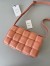 Bottega Veneta Padded Cassette Bag In Peachy Intrecciato Lambskin