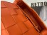 Bottega Veneta Cassette Bag In Orange Intreccio Lambskin