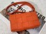 Bottega Veneta Cassette Bag In Orange Intreccio Lambskin