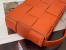 Bottega Veneta Cassette Bag In Orange Intreccio Lambskin