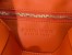 Bottega Veneta Cassette Bag In Orange Intreccio Lambskin