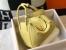 Hermes Lindy 26cm Bag in Jaune Poussin Clemence Leather with GHW