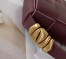 Bottega Veneta Cassette Bag In Burgundy Grained Intreccio Calfskin