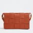 Bottega Veneta Cassette Bag In Maple Grained Intreccio Calfskin
