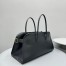 The Row Margaux EW Top Handle Bag in Black Smooth Calfskin